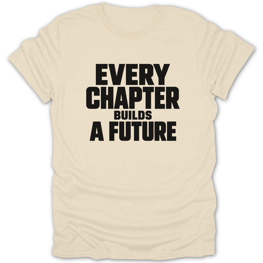 A cream-colored short-sleeved t-shirt featuring the black text Every Chapter Builds a Future on the chest.