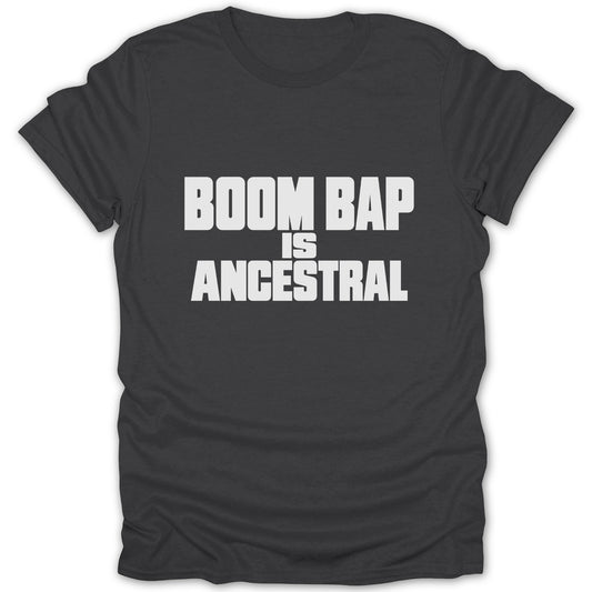 Dark grey short-sleeve t-shirt with white block lettering across the chest that reads BOOM BAP IS ANCESTRAL.
