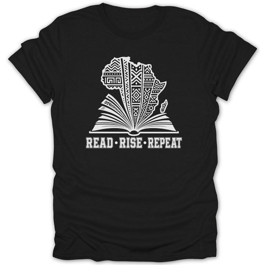 Black t-shirt with an open white book, outline of Africa with patterns, and text.