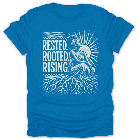 Blue t-shirt with white graphic: "Rested, Rooted, Rising" and woman with sun and roots.