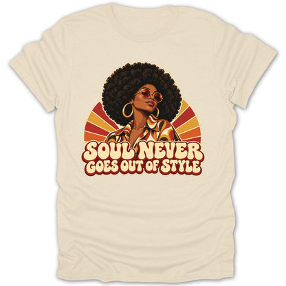 Retro illustration of a woman with an afro and sunglasses on a cream t-shirt.