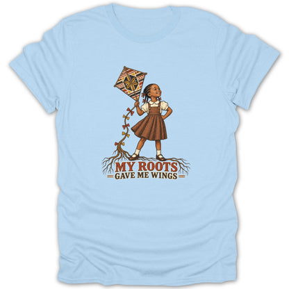Illustration of girl with kite on roots, with text "My Roots Gave Me Wings."