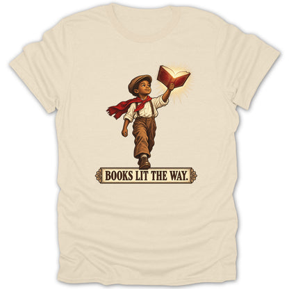 Boy in hat and scarf holds up glowing book with text "BOOKS LIT THE WAY."