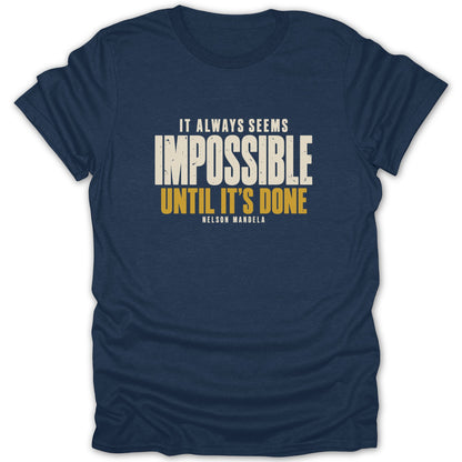 Navy blue short-sleeved t-shirt featuring the distressed text quote "IT ALWAYS SEEMS IMPOSSIBLE UNTIL IT'S DONE NELSON MANDELA".