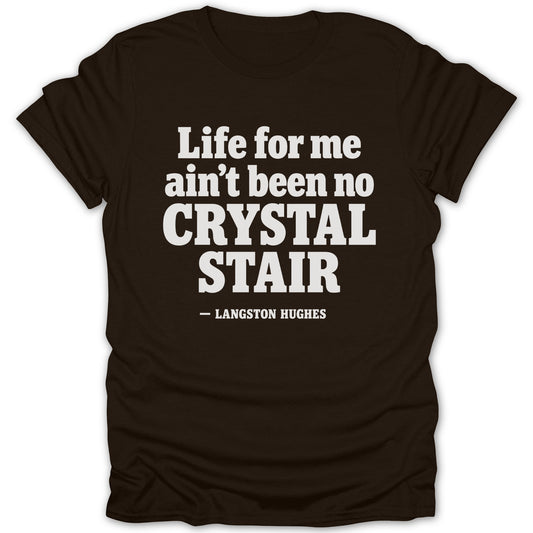 A black t-shirt printed with the quote Life for me ain't been no crystal stair and Langston Hughes.