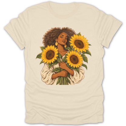 Illustration of a woman holding sunflowers on a cream t-shirt.