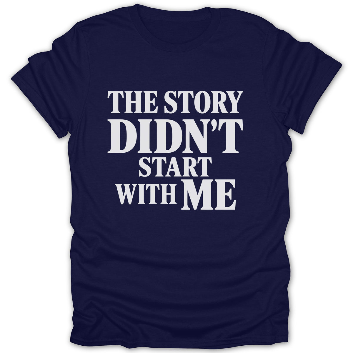 A dark blue t-shirt with white text that reads "THE STORY DIDN'T START WITH ME" centered on the chest.
