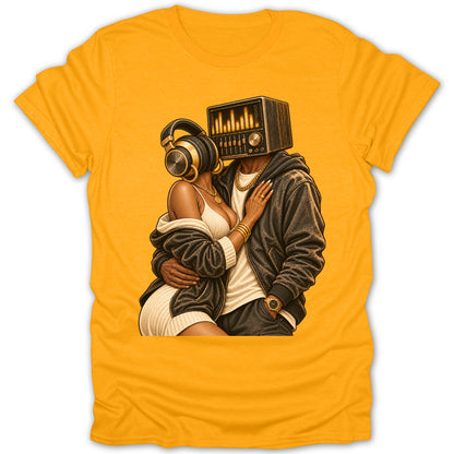 Couple embracing, one with a vintage radio head and headphones, on a yellow t-shirt.
