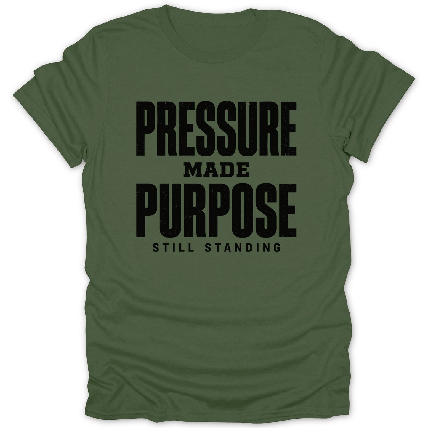 Green t-shirt with black text reading "PRESSURE MADE PURPOSE STILL STANDING".