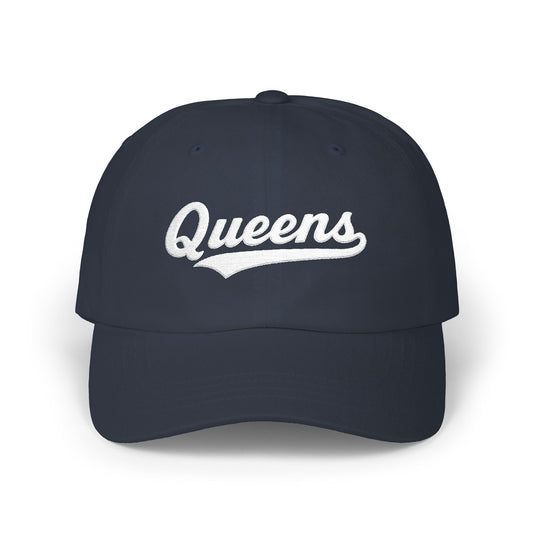 Navy baseball cap with "Queens" embroidered in white script.