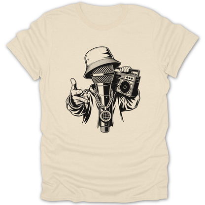 Microphone character with bucket hat, chain, and boombox on light beige t-shirt.
