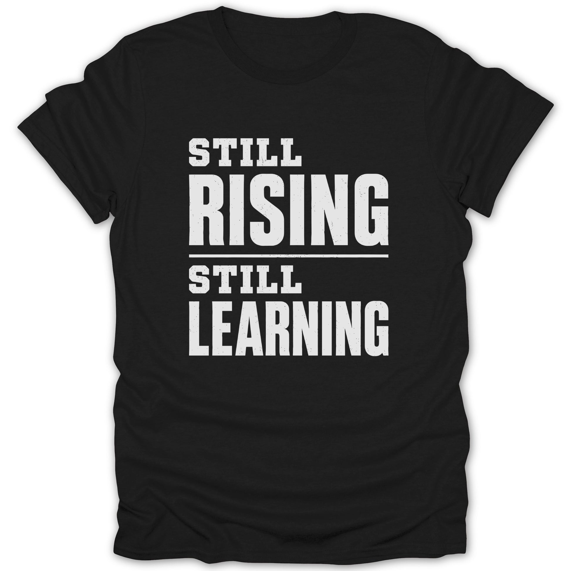 Black t-shirt with white text "STILL RISING STILL LEARNING".