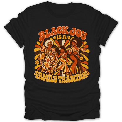 Black Joy is a Family Tradition text on a black t-shirt with retro art of dancing Black women.