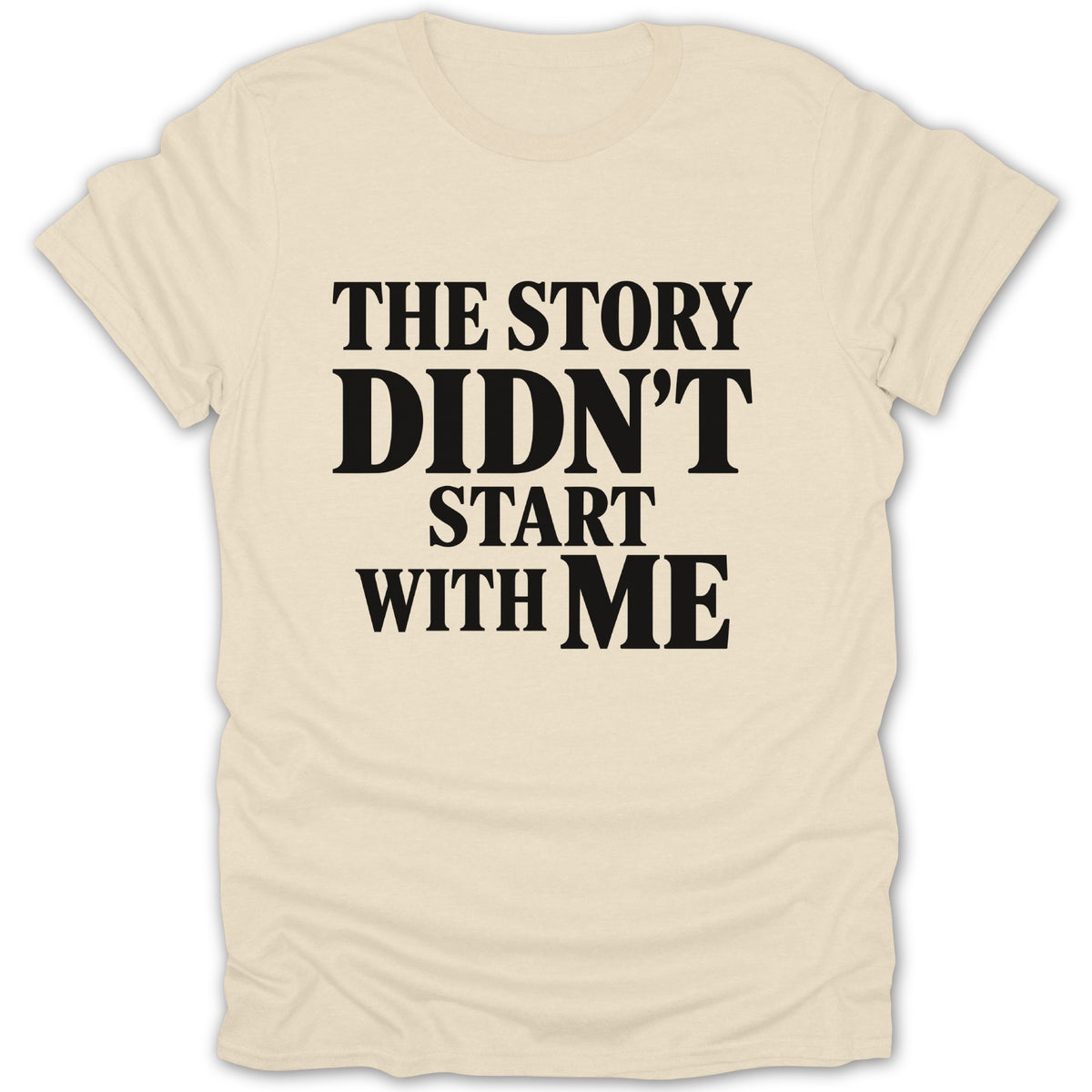 Cream-colored t-shirt featuring centered black text that reads The Story Didn't Start With Me.