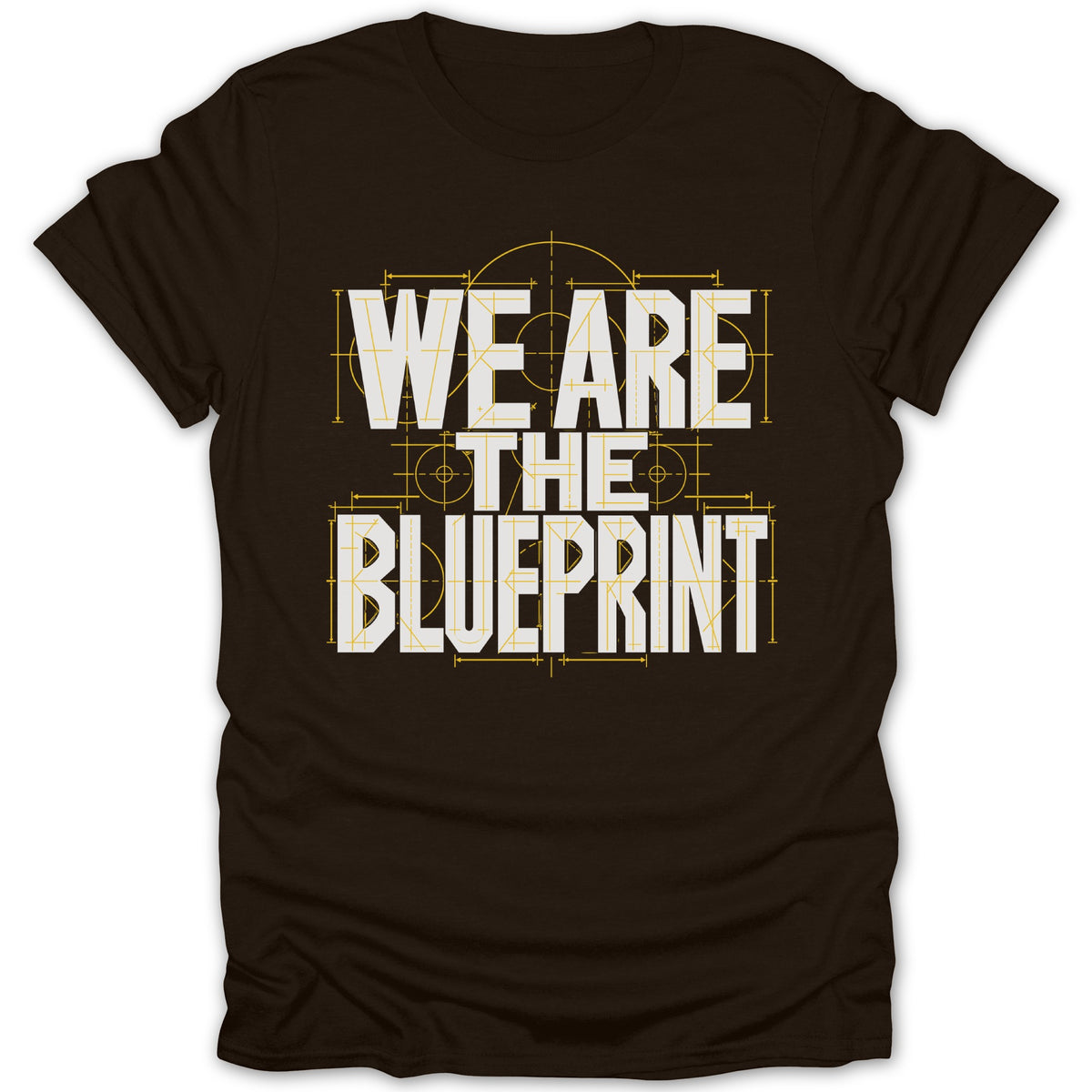 Dark brown t-shirt with white text "WE ARE THE BLUEPRINT" in blueprint style.