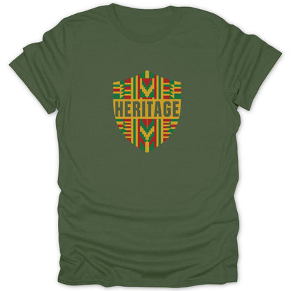 Olive green short-sleeved t-shirt featuring a central crest graphic with red, yellow, and green geometric patterns and the word HERITAGE.