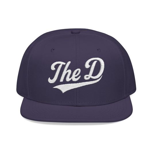 Dark purple baseball cap with white "The D" lettering in script.