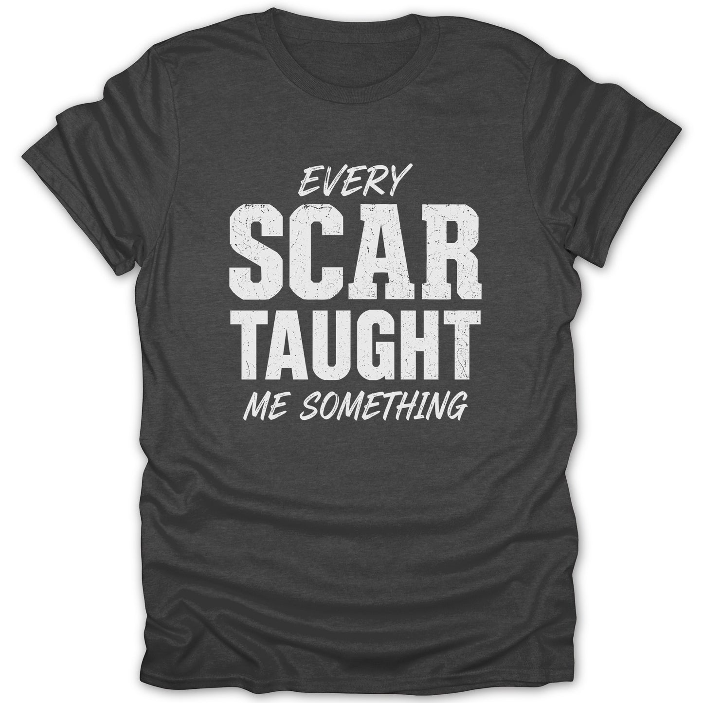 Dark grey t-shirt with white text that reads "EVERY SCAR TAUGHT ME SOMETHING".