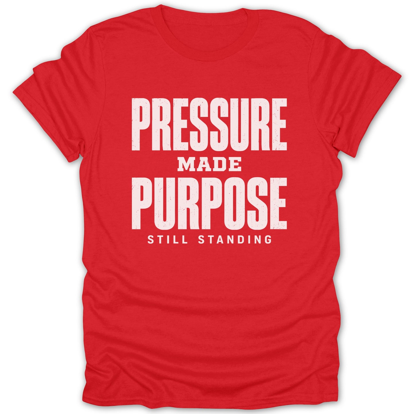 Red t-shirt with white text that reads "PRESSURE MADE PURPOSE STILL STANDING".
