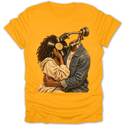 Couple with vinyl record head and turntable embraces on yellow t-shirt.