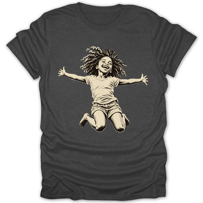 T-shirt with a graphic of a laughing child jumping with arms outstretched.