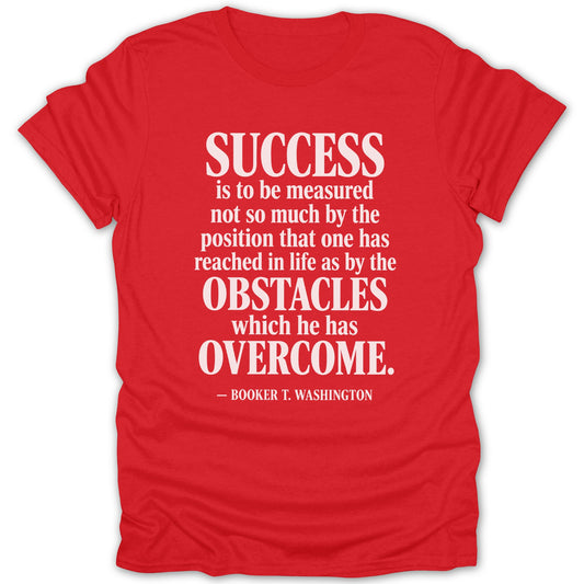 A red short-sleeved t-shirt with a white inspirational quote by Booker T. Washington printed on the front.