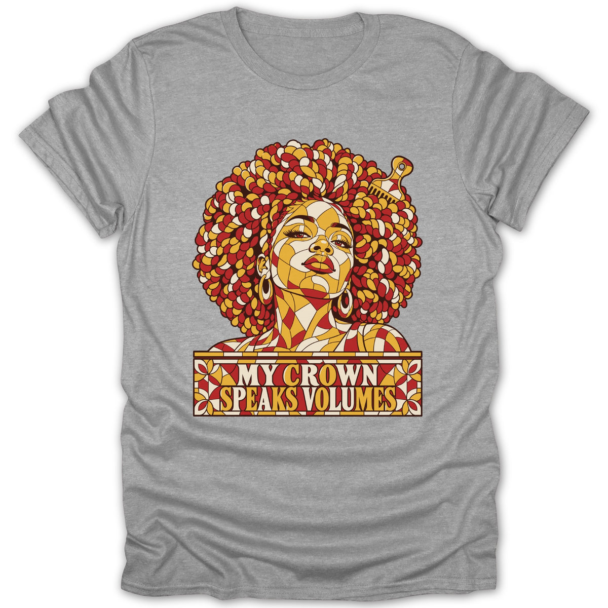 A heather gray short-sleeve t-shirt features a mosaic graphic of a Black woman with voluminous curly hair, alongside the text My Crown Speaks Volumes.