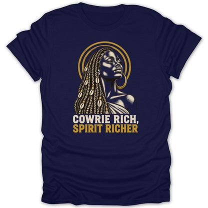 A dark blue short-sleeve t-shirt featuring an illustration of a Black woman with braided hair and cowrie shells, with the text "COWRIE RICH, SPIRIT RICHER".