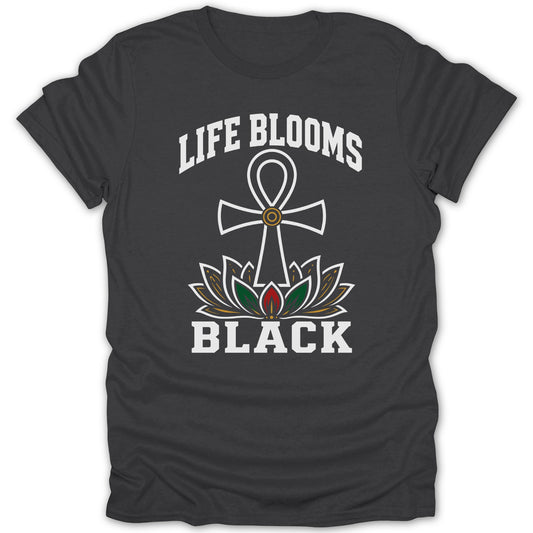 Dark t-shirt with white text "LIFE BLOOMS BLACK" and a lotus flower with an ankh.