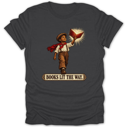 Boy holding an illuminated book with text "BOOKS LIT THE WAY."