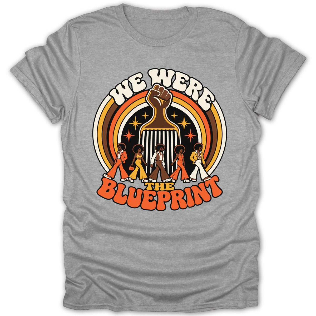 T-shirt with "We Were The Blueprint" text, fist, and retro figures.