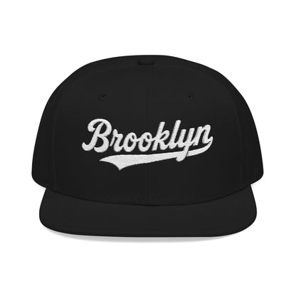 Black baseball cap with "Brooklyn" in white script lettering.