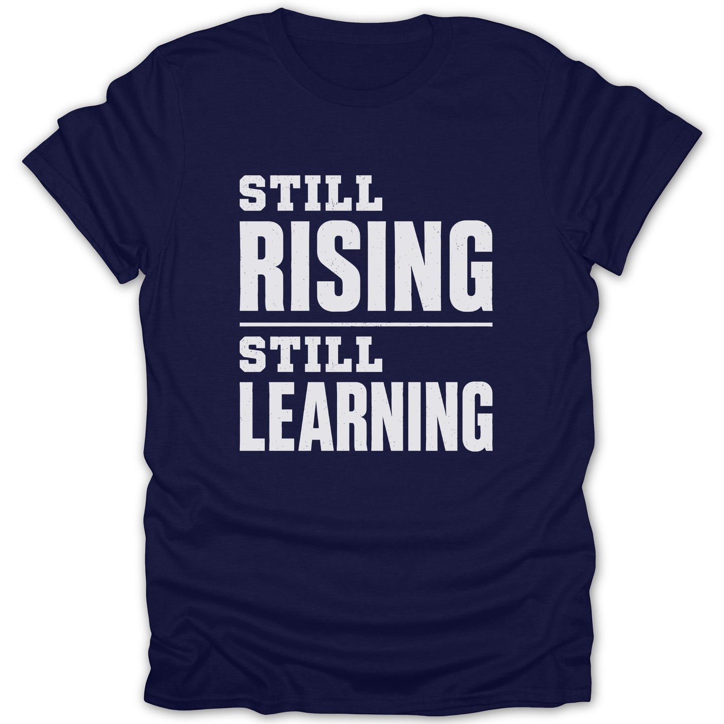 Navy t-shirt with white text reading "STILL RISING STILL LEARNING".