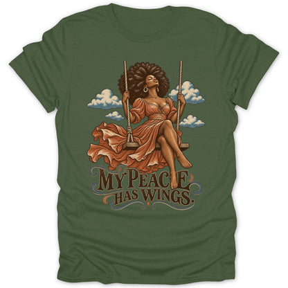Woman with large afro on a swing with text "MY PEACE HAS WINGS"