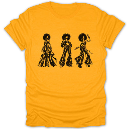 Yellow t-shirt with a black graphic of three women with afros in stylish disco-era clothing.