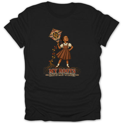 Girl with kite and text "MY ROOTS GAVE ME WINGS" on black t-shirt.