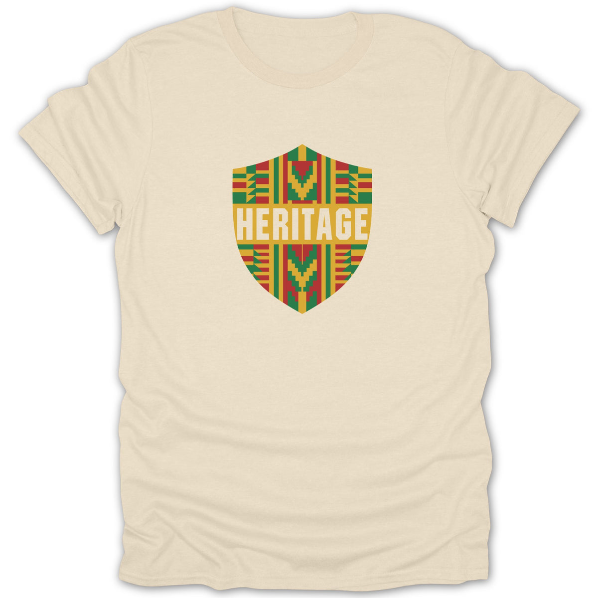 Cream-colored crewneck t-shirt featuring a shield-shaped graphic with red, green, and yellow patterns and the word HERITAGE.