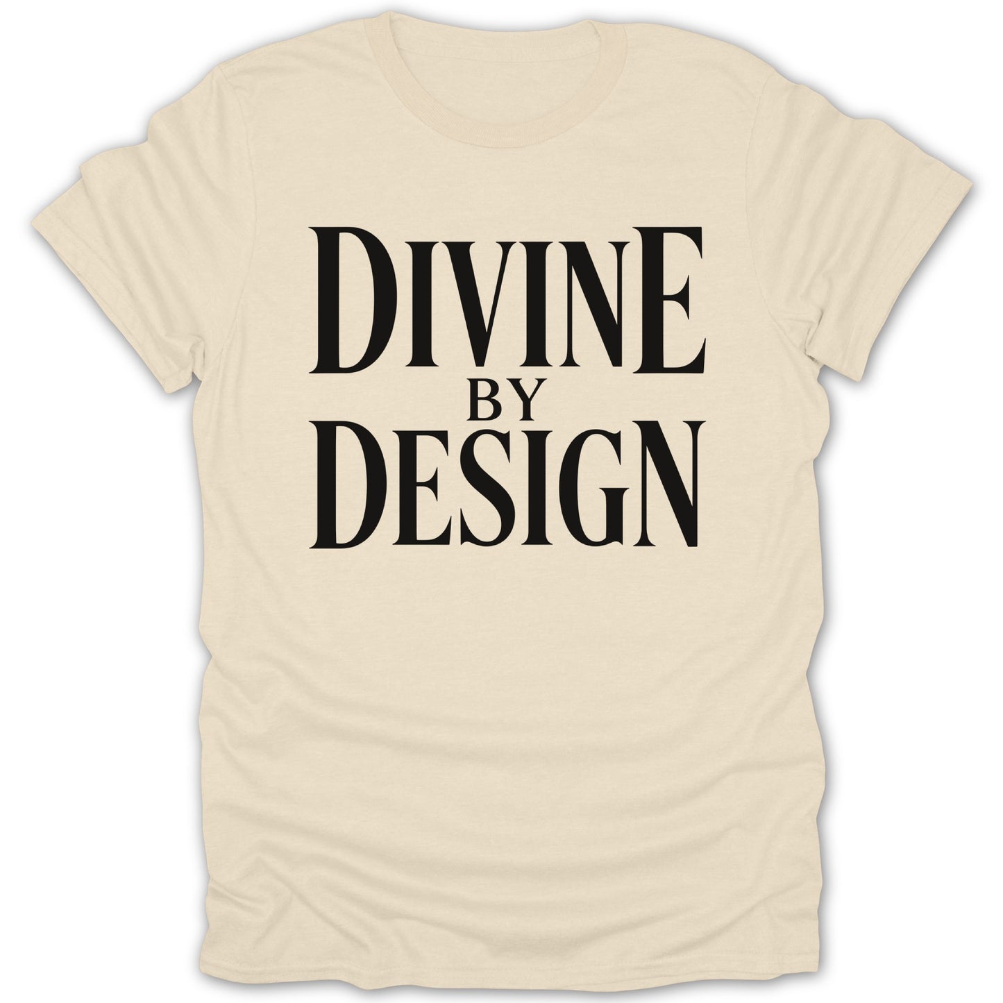 Cream t-shirt with black text that reads "DIVINE BY DESIGN".