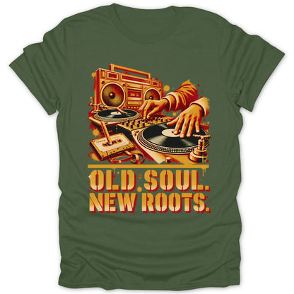 Olive green t-shirt featuring a retro DJ illustration, cassette tape, boombox, and Old Soul New Roots text.