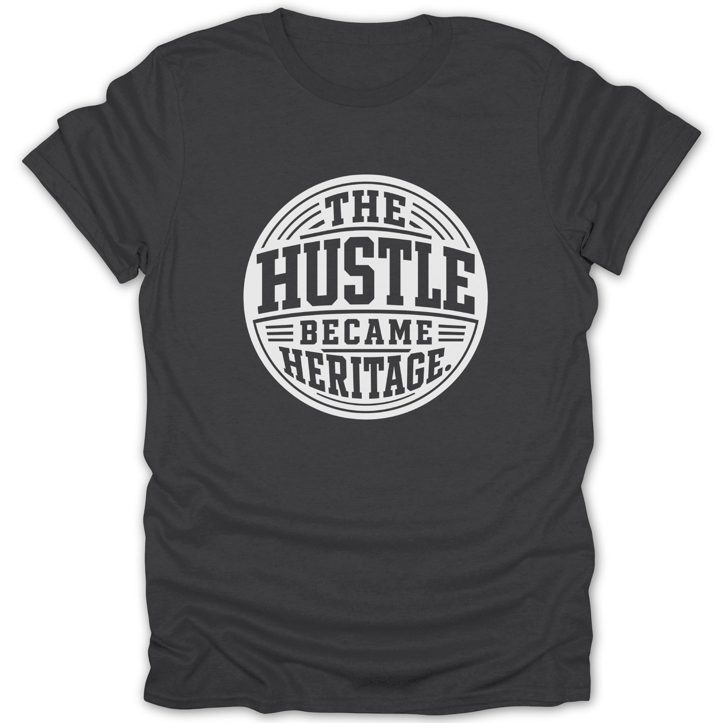 Dark grey t-shirt with white text: THE HUSTLE BECAME HERITAGE.