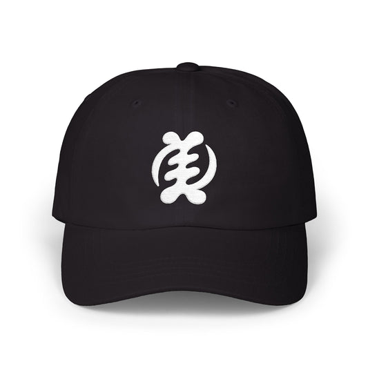Black baseball cap with white Adinkra symbol Gye Nyame embroidered on front.