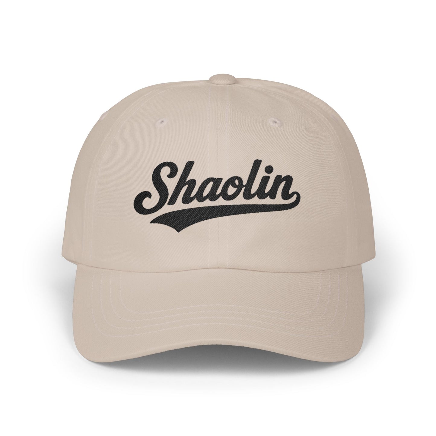 Tan baseball cap with "Shaolin" text in black cursive font.