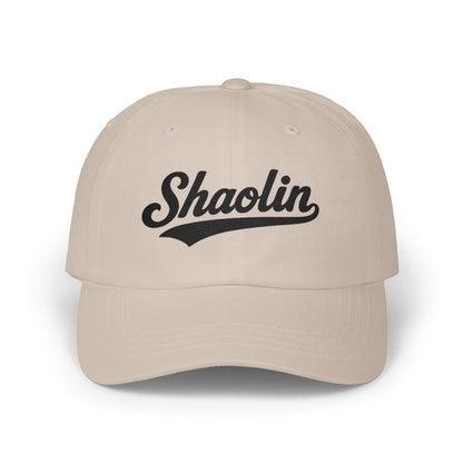 Tan baseball cap with "Shaolin" text in black cursive font.