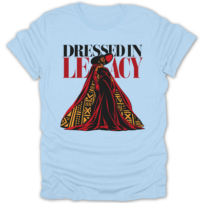 Light blue t-shirt with "DRESSED IN LEGACY" and a regal woman.