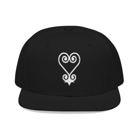Black snapback hat with white Adinkra symbol Sankofa embroidered on front.