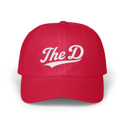 Red baseball cap with "The D" logo in white script.