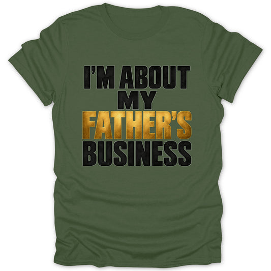 Olive green t-shirt with text "I'M ABOUT MY FATHER'S BUSINESS".