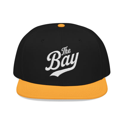 Black and yellow snapback hat with "The Bay" embroidered in white script.