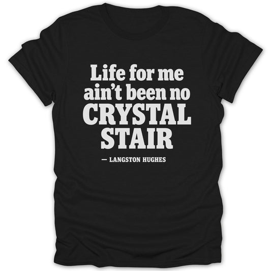 Black t-shirt featuring white text that reads Life for me ain't been no crystal stair, attributed to Langston Hughes.