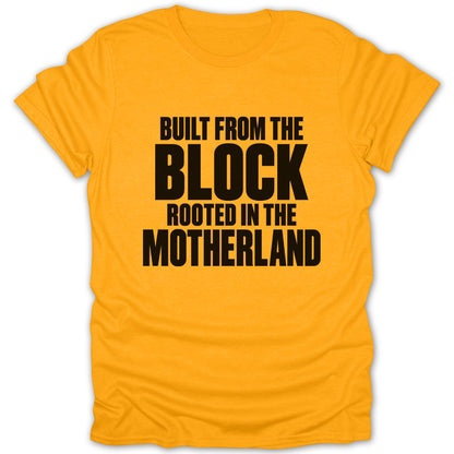 Bright yellow short-sleeve t-shirt featuring bold black text that reads BUILT FROM THE BLOCK ROOTED IN THE MOTHERLAND.